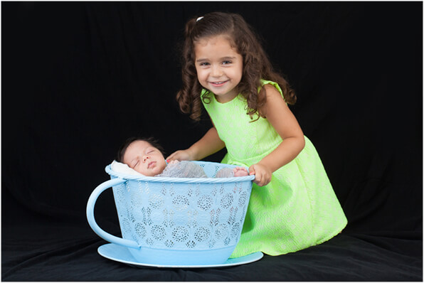 baby and sister photo