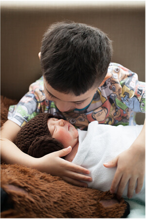infant baby with brother