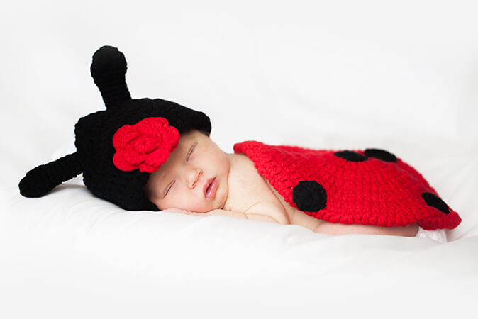 newborn sleeping baby lady bug